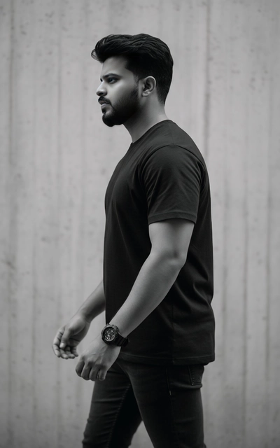 Black and white portrait of a young man walking in profile view